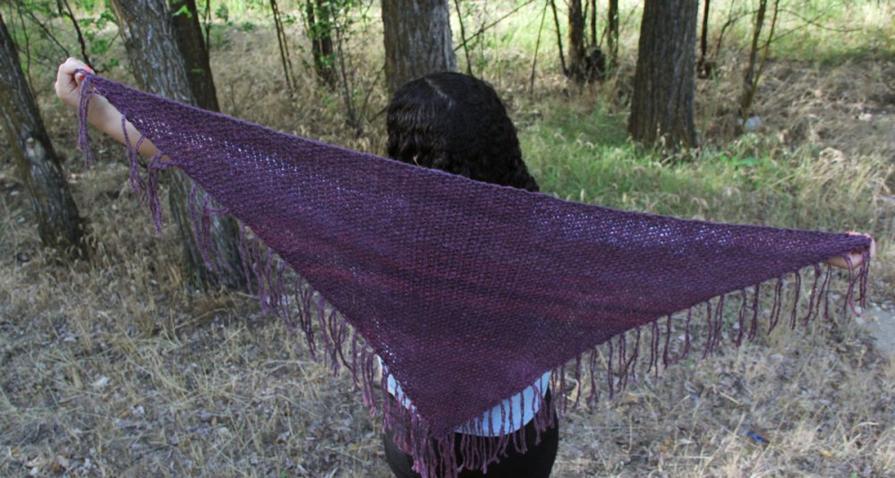 Large enough to wear as a shawl or scarf.